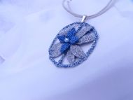 Náhrdelník kolo s květinou modro-stříbný